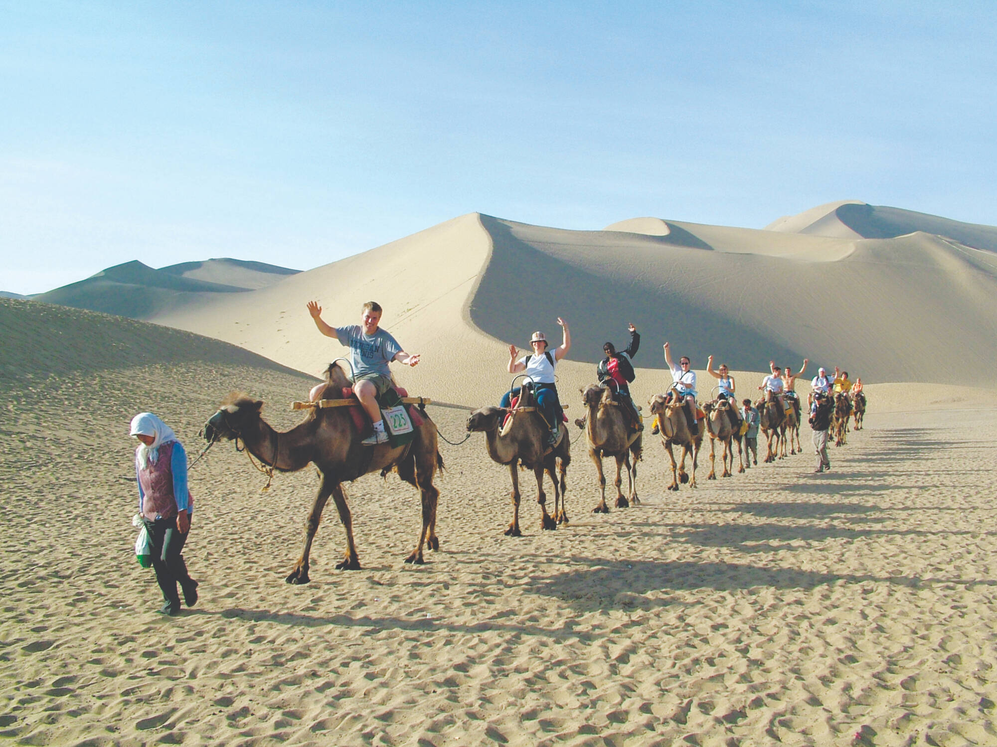 Students ride camels on a study abroad trip.